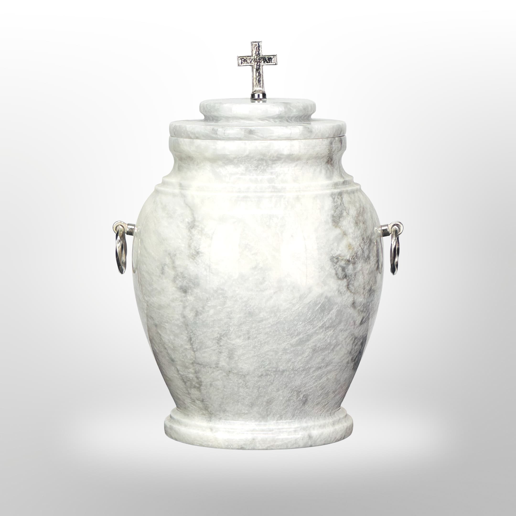 Klassische Urne aus weißem Naturstein.