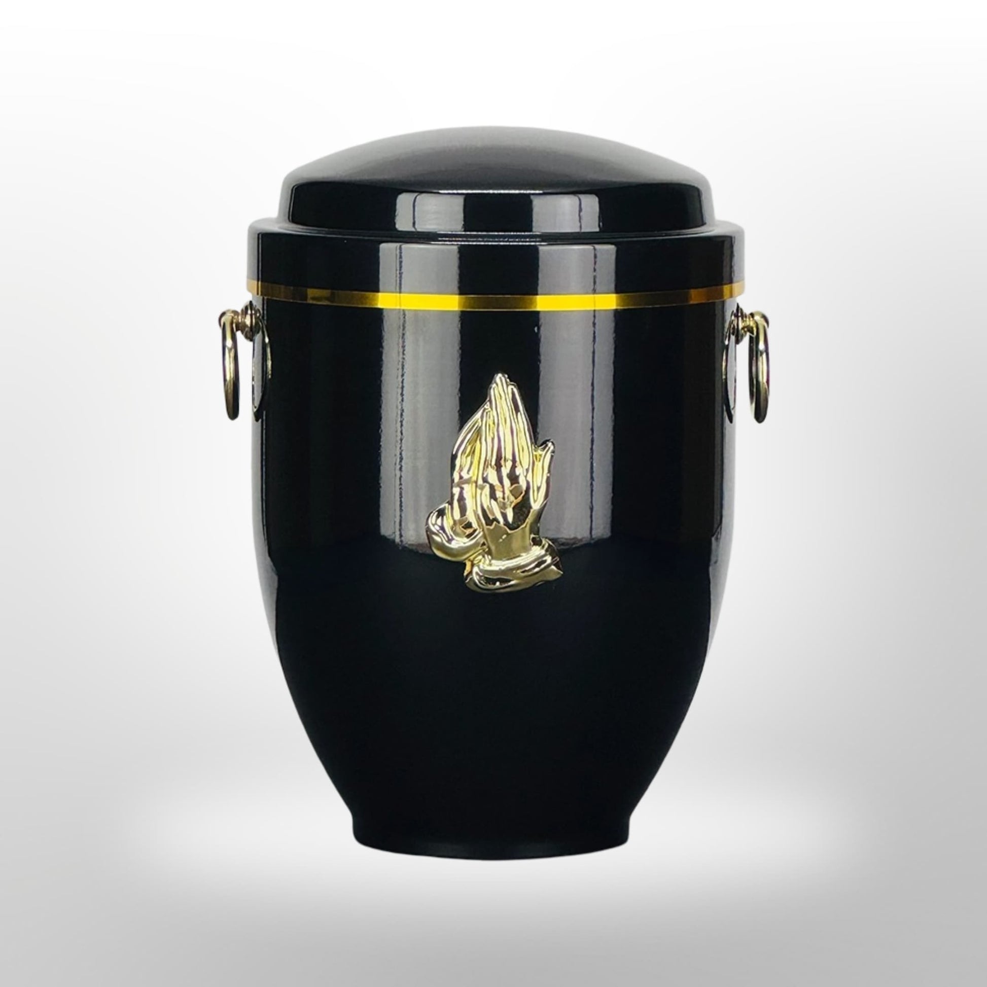 Metallurne in Schwarz mit Griffen und Händen